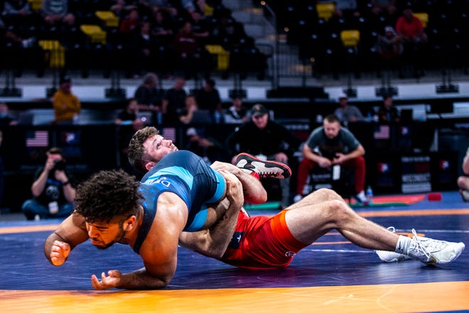 Jaydin Eierman, right, wrestles Dom Demas at 65 kg during the UWW Senior National freestyle wrestling championships, Saturday, May 1, 2021, at the Xtream Arena in Coralville, Iowa.