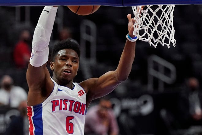 Pistons guard Hamidou Diallo grabs a rebound during the first half against the Nuggets on Friday, May 14, 2021, at Little Caesars Arena.