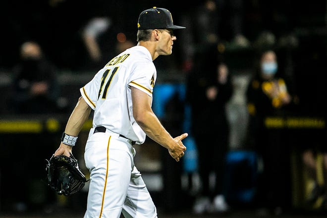 Iowa's Dylan Nedved (17) celebrates after throwing a strikeout during a NCAA Big Ten Conference baseball game against Illinois, Friday, May 14, 2021, at Duane Banks Field in Iowa City, Iowa.