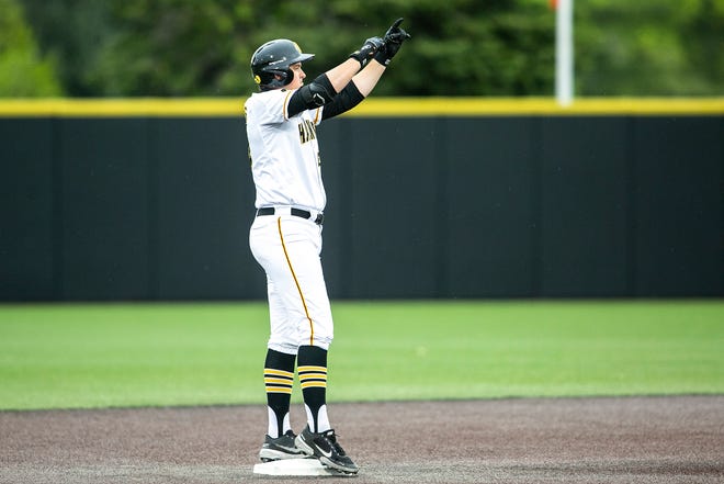 Iowa's Peyton Williams (45) reacts after hitting a double during a NCAA Big Ten Conference baseball game against Illinois, Friday, May 14, 2021, at Duane Banks Field in Iowa City, Iowa.