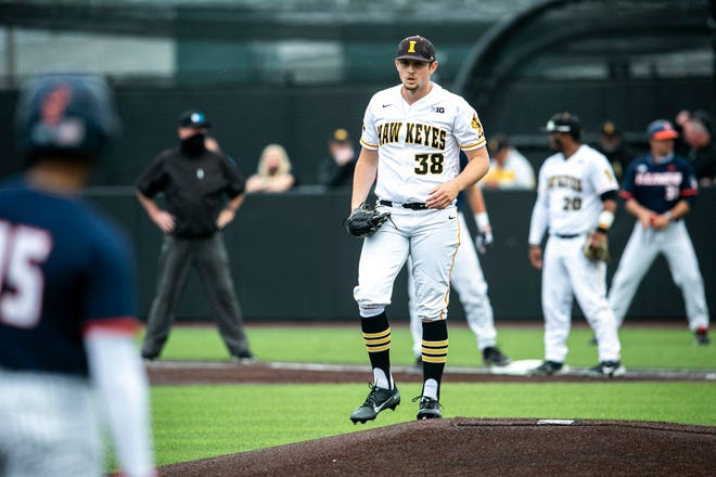 Iowa's Trenton Wallace (38) stares down a runner during a NCAA Big Ten Conference baseball game against Illinois, Friday, May 14, 2021, at Duane Banks Field in Iowa City, Iowa.