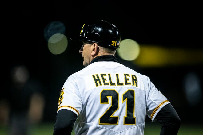Iowa head coach Rick Heller looks into the outfield during a NCAA Big Ten Conference baseball game against Illinois, Friday, May 14, 2021, at Duane Banks Field in Iowa City, Iowa.