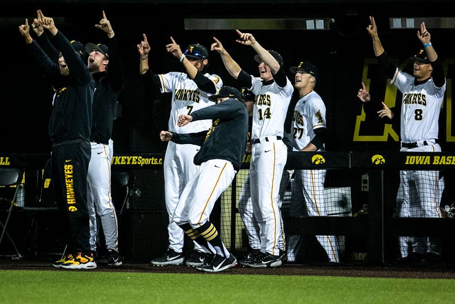 Iowa Hawkeyes players celebrate during a NCAA Big Ten Conference baseball game against Illinois, Friday, May 14, 2021, at Duane Banks Field in Iowa City, Iowa.