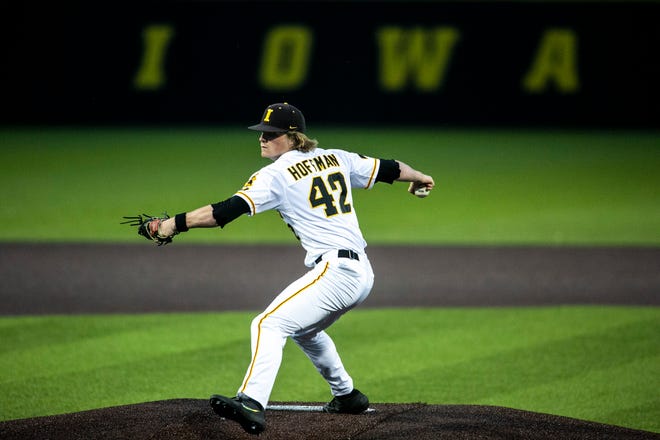 Iowa's Trace Hoffman (42) delivers a pitch during a NCAA Big Ten Conference baseball game against Illinois, Friday, May 14, 2021, at Duane Banks Field in Iowa City, Iowa.