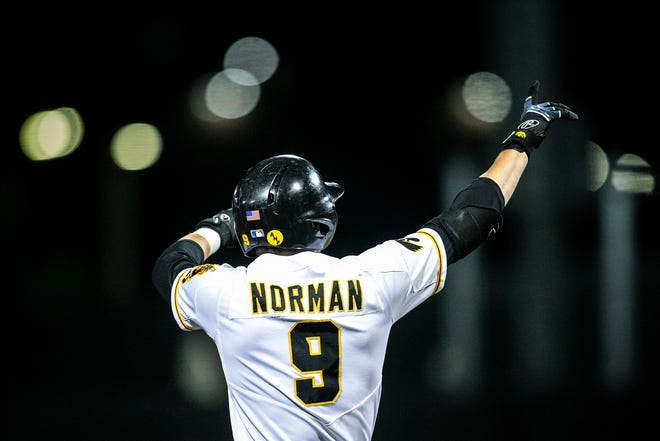 Iowa's Ben Norman (9) celebrates after hitting a triple during a NCAA Big Ten Conference baseball game against Illinois, Friday, May 14, 2021, at Duane Banks Field in Iowa City, Iowa.