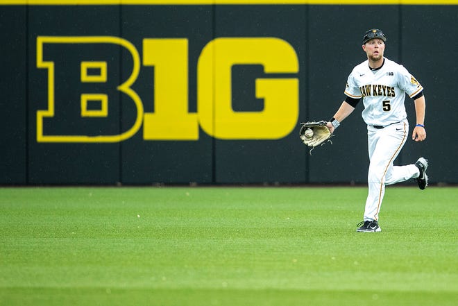 Iowa's Zeb Adreon (5) shows off the ball after getting an out during a NCAA Big Ten Conference baseball game against Illinois, Friday, May 14, 2021, at Duane Banks Field in Iowa City, Iowa.