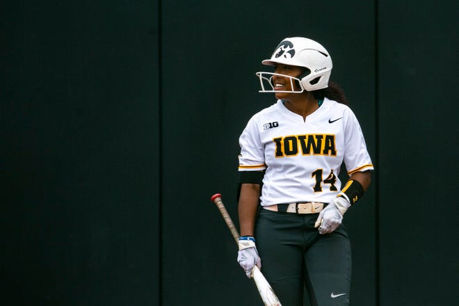 Iowa's Nia Carter (14) bats during a NCAA Big Ten Conference softball game against Illinois, Sunday, May 16, 2021, at Bob Pearl Field in Iowa City, Iowa.