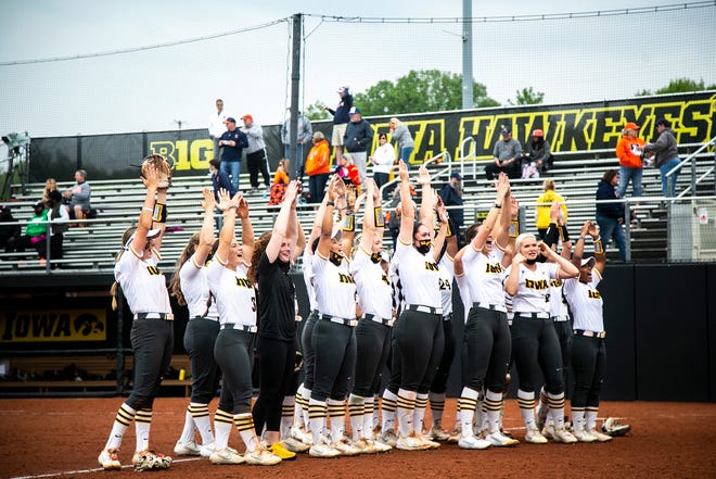 Iowa Hawkeyes players celebrate after a NCAA Big Ten Conference softball game against Illinois, Sunday, May 16, 2021, at Bob Pearl Field in Iowa City, Iowa.