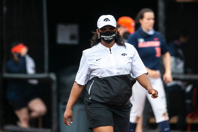 Iowa assistant coach Trena Prater wears a mask reading "Representation Matters" during a NCAA Big Ten Conference softball game against Illinois, Sunday, May 16, 2021, at Bob Pearl Field in Iowa City, Iowa.