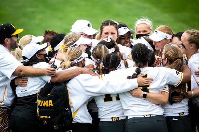 Iowa Hawkeyes players celebrate after a NCAA Big Ten Conference softball game against Illinois, Sunday, May 16, 2021, at Bob Pearl Field in Iowa City, Iowa.