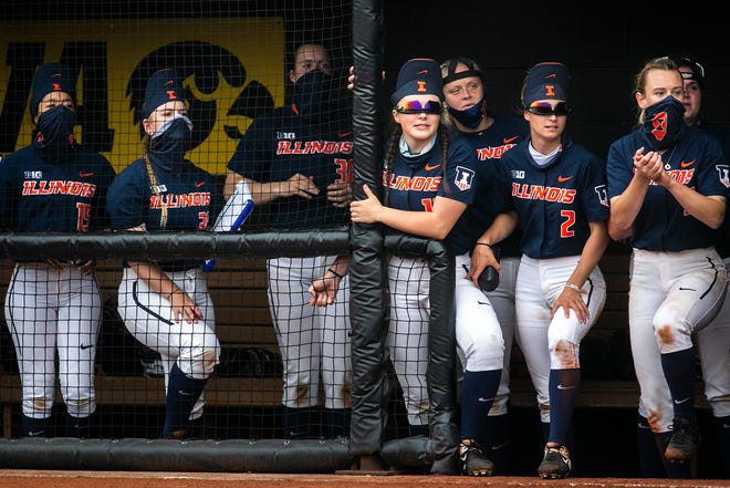 Illinois Fighting Illini players cheer from the dugout during a NCAA Big Ten Conference softball game against Iowa, Sunday, May 16, 2021, at Bob Pearl Field in Iowa City, Iowa.