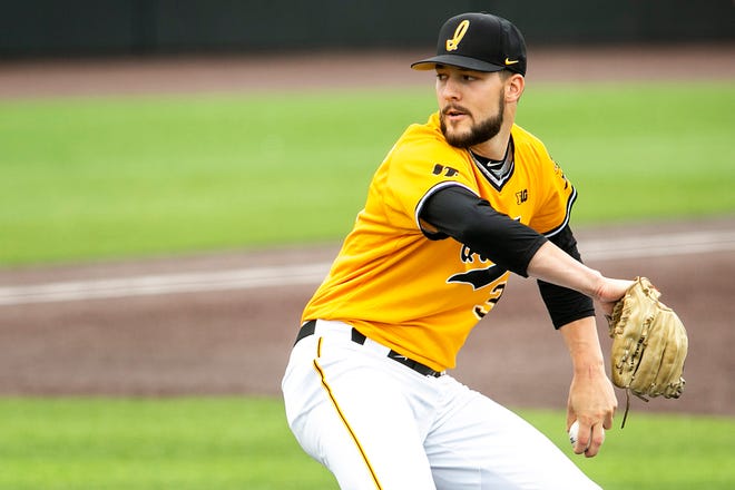Iowa's Cam Baumann (35) delivers a pitch during a NCAA Big Ten Conference baseball game against Illinois, Sunday, May 16, 2021, at Duane Banks Field in Iowa City, Iowa.