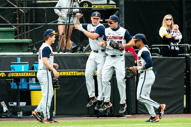 Illinois' Nathan Aide, second from right, celebrates with teammates after snagging an out in deep center field during a NCAA Big Ten Conference baseball game against Iowa, Sunday, May 16, 2021, at Duane Banks Field in Iowa City, Iowa.