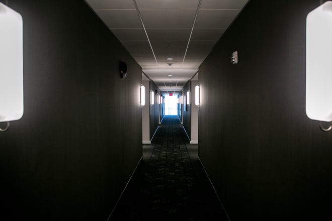 Light fixtures line a hallway, Wednesday, May 26, 2021, at the Courtyard Marriott in University Heights, Iowa.