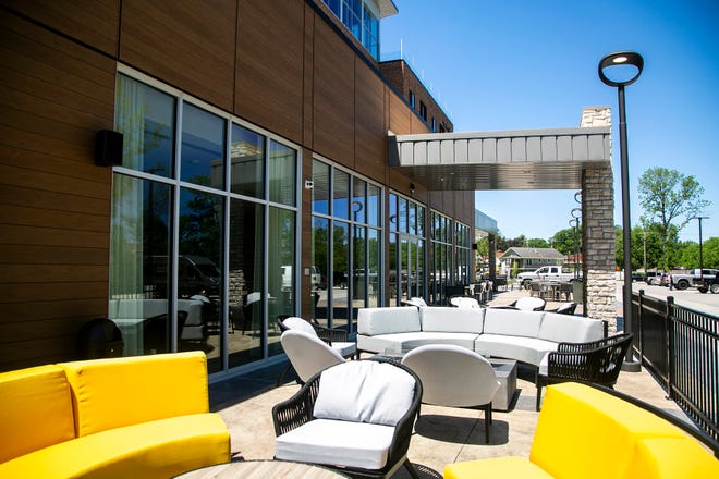 A general view of an outdoor seating area is seen, Wednesday, May 26, 2021, at the Courtyard Marriott in University Heights, Iowa.