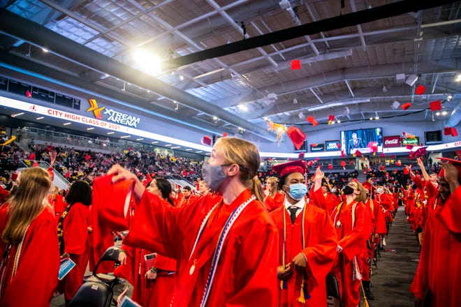 The newest graduates of Iowa City High School celebrate during the graduation Commencement Ceremony, Sunday, June 6, 2021, at the Xtream Arena in Coralville, Iowa.