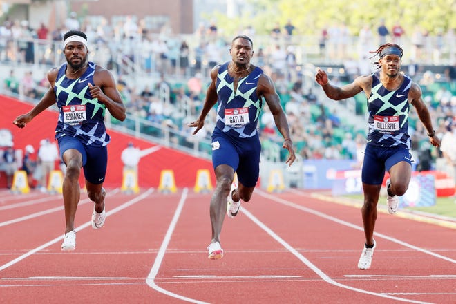 EUGENE, OREGON - JUNE 20: Kenny Bednarek, Justin Gatlin and Cravon Gillespie compete in the Men's 100 Meter Semi-Final on day three of the 2020 U.S. Olympic Track & Field Team Trials at Hayward Field on June 20, 2021 in Eugene, Oregon. (Photo by Steph Chambers/Getty Images)
