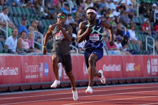 Jun 19, 2021; Eugene, OR, USA; Kenny Bednarek and Chris Royster run in a 100m heat during the US Olympic Team Trials at Hayward Field. Mandatory Credit: Kirby Lee-USA TODAY Sports