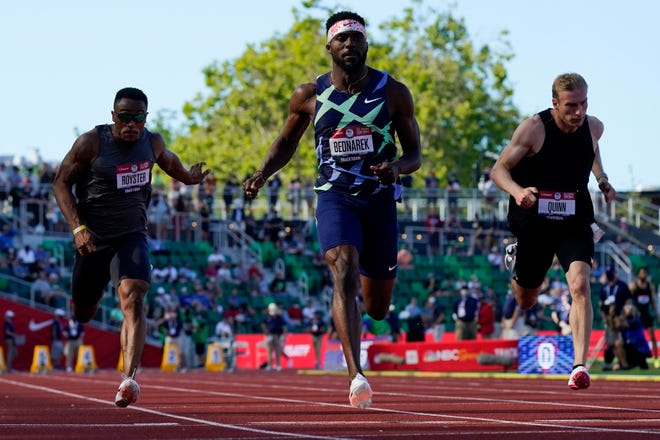 Kenny Bednarek wins the first heat of the men's 100-meter run at the U.S. Olympic Track and Field Trials Saturday, June 19, 2021, in Eugene, Ore. (AP Photo/Ashley Landis)