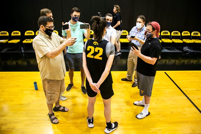 Iowa guard Caitlin Clark (22) speaks to reporters after a summer Hawkeyes women's basketball practice, Thursday, July 1, 2021, at Carver-Hawkeye Arena in Iowa City, Iowa.