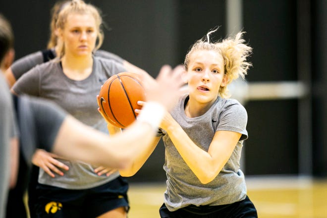 Iowa guard Kylie Feuerbach catches a pass during a summer Hawkeyes women's basketball practice, Thursday, July 1, 2021, at Carver-Hawkeye Arena in Iowa City, Iowa.