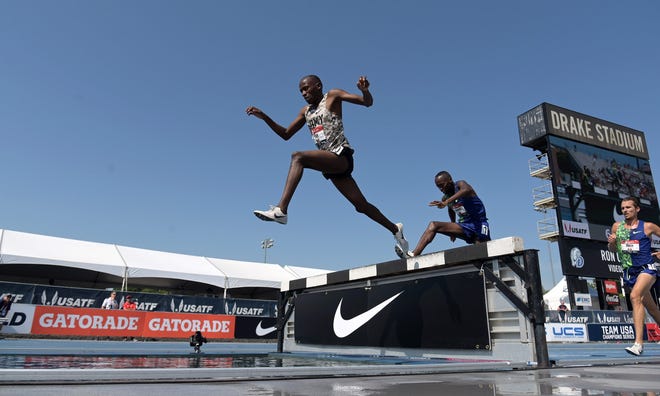 Jul 27, 2019; Des Moines, IA, USA; Hillary Bor (left) defeats Stanley Kebenei (center) to win the steeplechase, 8:18.05 to 8:19.12,  during the USATF Championships at Drake Stadium. Andy Bayer aka Andrew Bayer (right) was third in 8:23.23 Mandatory Credit: Kirby Lee-USA TODAY Sports
