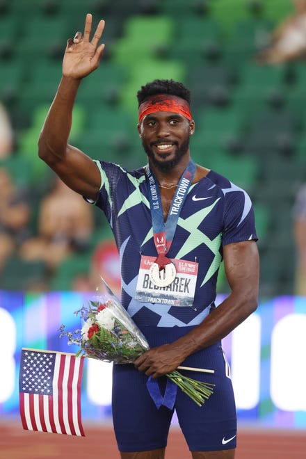 EUGENE, OREGON - JUNE 27: Kenny Bednarek waves from the podium after placing second in the Men's 200 Meter Final during day ten of the 2020 U.S. Olympic Track & Field Team Trials at Hayward Field on June 27, 2021 in Eugene, Oregon. (Photo by Andy Lyons/Getty Images) ORG XMIT: 775482202 ORIG FILE ID: 1325842657