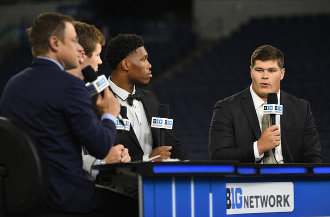 Tyler Linderbaum is literally Iowa's center of attention heading into the 2021 season. Here, he takes questions from BTN's Dave Revsine at Lucas Oil Stadium.