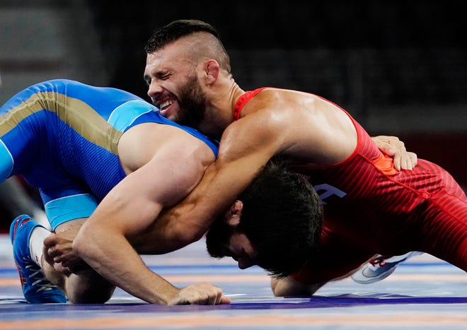 Aug 4, 2021; Chiba, Japan; Zavur Uguev (ROC) defeats Thomas Patrick Gilman (USA) in a men's freestyle 57kg 1/8 final during the Tokyo 2020 Olympic Summer Games at Makuhari Messe Hall A. Mandatory Credit: Mandi Wright-USA TODAY Sports