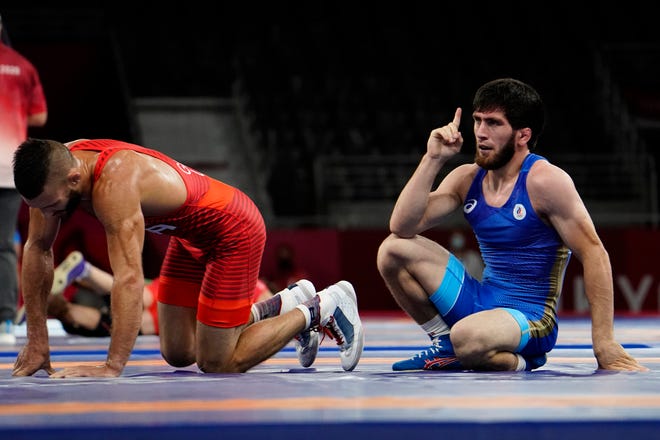 Aug 4, 2021; Chiba, Japan; Zavur Uguev (ROC) defeats Thomas Patrick Gilman (USA) in a men's freestyle 57kg 1/8 final during the Tokyo 2020 Olympic Summer Games at Makuhari Messe Hall A. Mandatory Credit: Mandi Wright-USA TODAY Sports