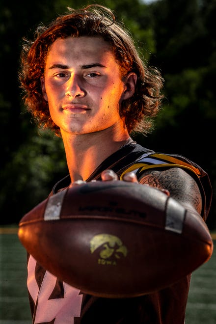 Iowa wide receiver Brody Brecht (14) poses for a photo during the Iowa Hawkeye football media day on Friday, Aug. 13, 2021 in Iowa City, IA.
