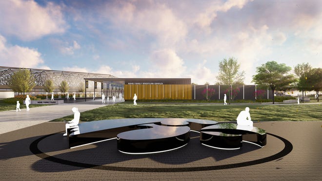 A rendering shows the future home to the Iowa Hawkeyes men's and women's wrestling teams next to Carver-Hawkeye Arena, with a groundbreaking set to take place in Spring 2022.