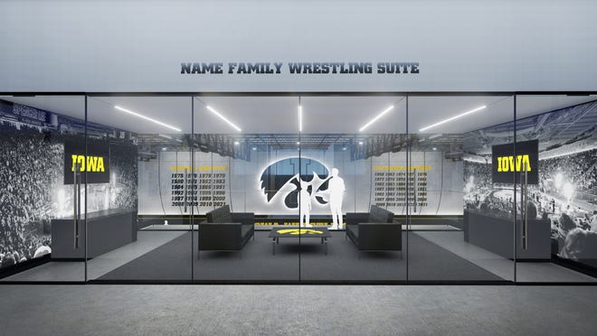 A rendering shows the future home to the Iowa Hawkeyes men's and women's wrestling teams next to Carver-Hawkeye Arena, with a groundbreaking set to take place in Spring 2022.
