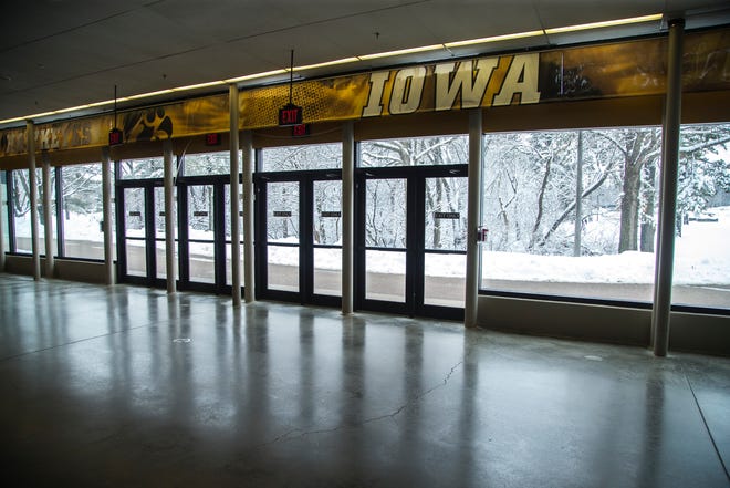 Snow covers the ground outside Carver-Hawkeye Arena near the future site of a building for the Iowa Hawkeyes wrestling team, Sunday, Jan. 31, 2021, in Iowa City, Iowa.