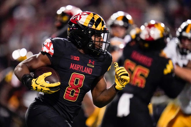 Maryland running back Tayon Fleet-Davis runs with the ball against Iowa during an NCAA college football game, Friday, Oct. 1, 2021, at Capital One Field at Maryland Stadium in College Park, Maryland.