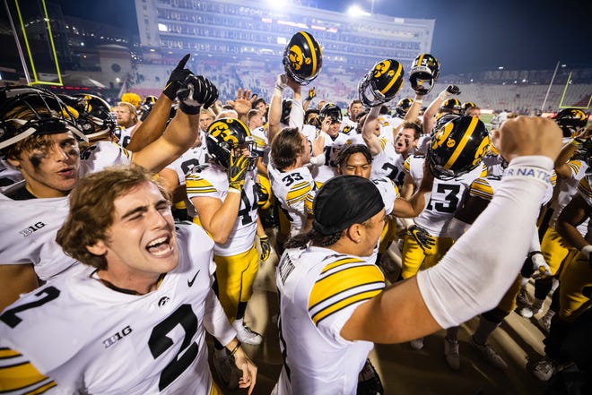 Iowa Hawkeyes players celebrates after an NCAA college football game, Friday, Oct. 1, 2021, at Capital One Field at Maryland Stadium in College Park, Maryland.