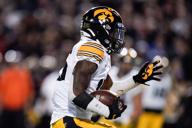 Iowa running back Tyler Goodson runs with the ball against Maryland during an NCAA college football game, Friday, Oct. 1, 2021, at Capital One Field at Maryland Stadium in College Park, Maryland.