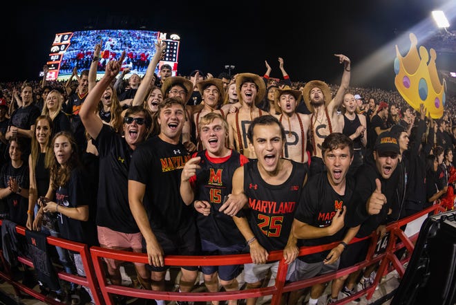 Maryland fans celebrate during an NCAA college football game against Iowa, Friday, Oct. 1, 2021, at Capital One Field at Maryland Stadium in College Park, Maryland.
