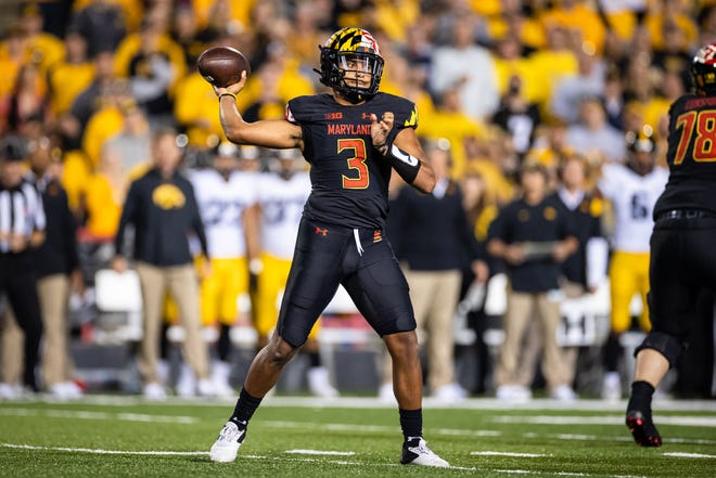 Maryland Terrapins quarterback Taulia Tagovailoa (3) looks to pass against the Iowa Hawkeyes during an NCAA college football game, Friday, Oct. 1, 2021, at Capital One Field at Maryland Stadium in College Park, Maryland.
