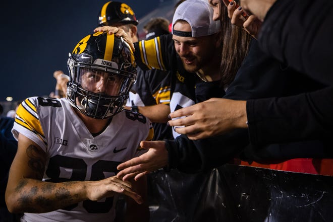 Iowa Hawkeyes wide receiver Nico Ragaini (89) celebrates with fans after a game against the Maryland Terrapins, Friday, Oct. 2, 2021, at Capital One Field at Maryland Stadium in College Park, Maryland.
