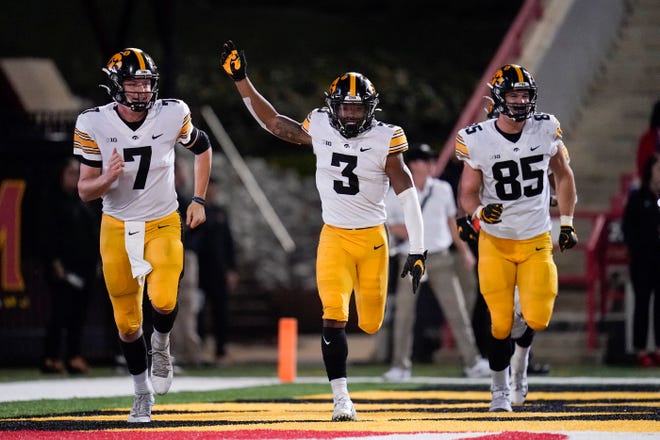 Iowa wide receiver Tyrone Tracy Jr. (3) celebrates his touchdown catch on a pass from quarterback Spencer Petras (7) during an NCAA college football game, Friday, Oct. 1, 2021, at Capital One Field at Maryland Stadium in College Park, Maryland.