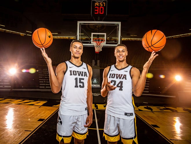 Kris Murray and Keegan Murray stand for a photo during Iowa Men's basketball media day at Carver Hawkeye Arena, Monday, Oct. 11, 2021.