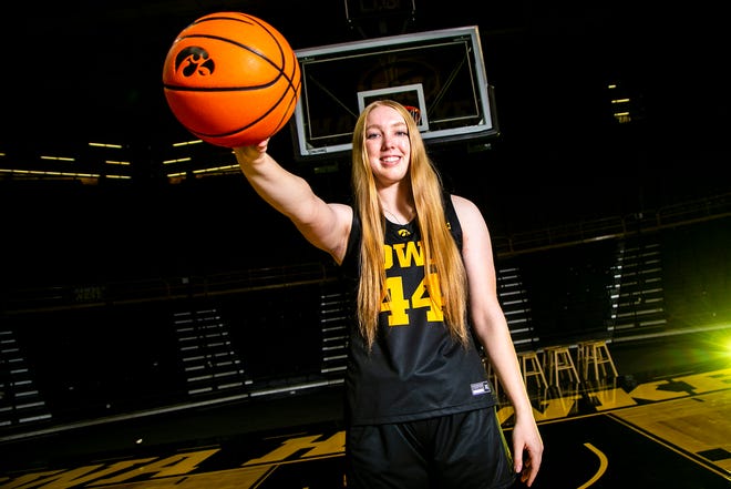 Iowa's Addison O'Grady (44) poses for a photo during Hawkeyes NCAA college women's basketball media day, Thursday, Oct. 28, 2021, at Carver-Hawkeye Arena in Iowa City, Iowa.