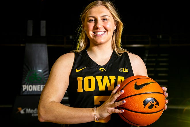 Iowa guard Sydney Affolter (3) poses for a photo during Hawkeyes NCAA college women's basketball media day, Thursday, Oct. 28, 2021, at Carver-Hawkeye Arena in Iowa City, Iowa.