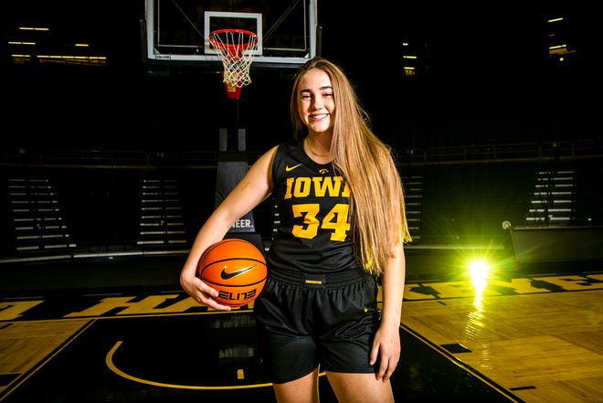 Iowa forward AJ Ediger (34) poses for a photo during Hawkeyes NCAA college women's basketball media day, Thursday, Oct. 28, 2021, at Carver-Hawkeye Arena in Iowa City, Iowa.
