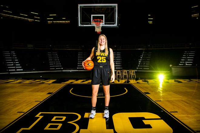 Iowa center Monika Czinano (25) poses for a photo during Hawkeyes NCAA college women's basketball media day, Thursday, Oct. 28, 2021, at Carver-Hawkeye Arena in Iowa City, Iowa.