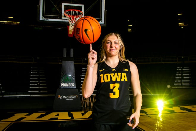 Iowa guard Sydney Affolter (3) poses for a photo during Hawkeyes NCAA college women's basketball media day, Thursday, Oct. 28, 2021, at Carver-Hawkeye Arena in Iowa City, Iowa.