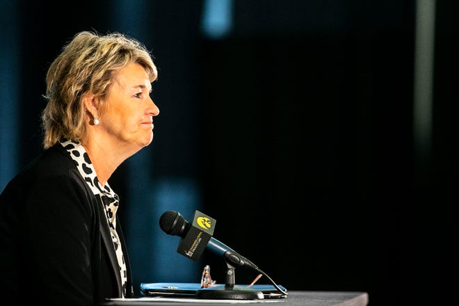 Iowa head coach Lisa Bluder listens to a question while speaking to reporters at a news conference during Hawkeyes NCAA college women's basketball media day, Thursday, Oct. 28, 2021, at Carver-Hawkeye Arena in Iowa City, Iowa.