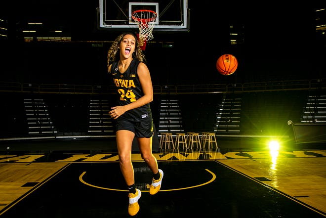 Iowa guard Gabbie Marshall (24) poses for a photo during Hawkeyes NCAA college women's basketball media day, Thursday, Oct. 28, 2021, at Carver-Hawkeye Arena in Iowa City, Iowa.