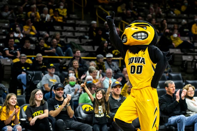 Herky the Hawk waves to people in the crowd during a NCAA women's basketball exhibition game against Truman State, Thursday, Nov. 4, 2021, at Carver-Hawkeye Arena in Iowa City, Iowa.